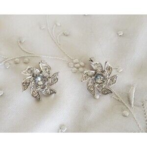 Vintage Bogoff Signed Earrings Clear Rhinestone Flower Swirl Shape Clip Back